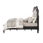 Grand lit avec tête de lit capitonnée, revêtement beige et cadre noir